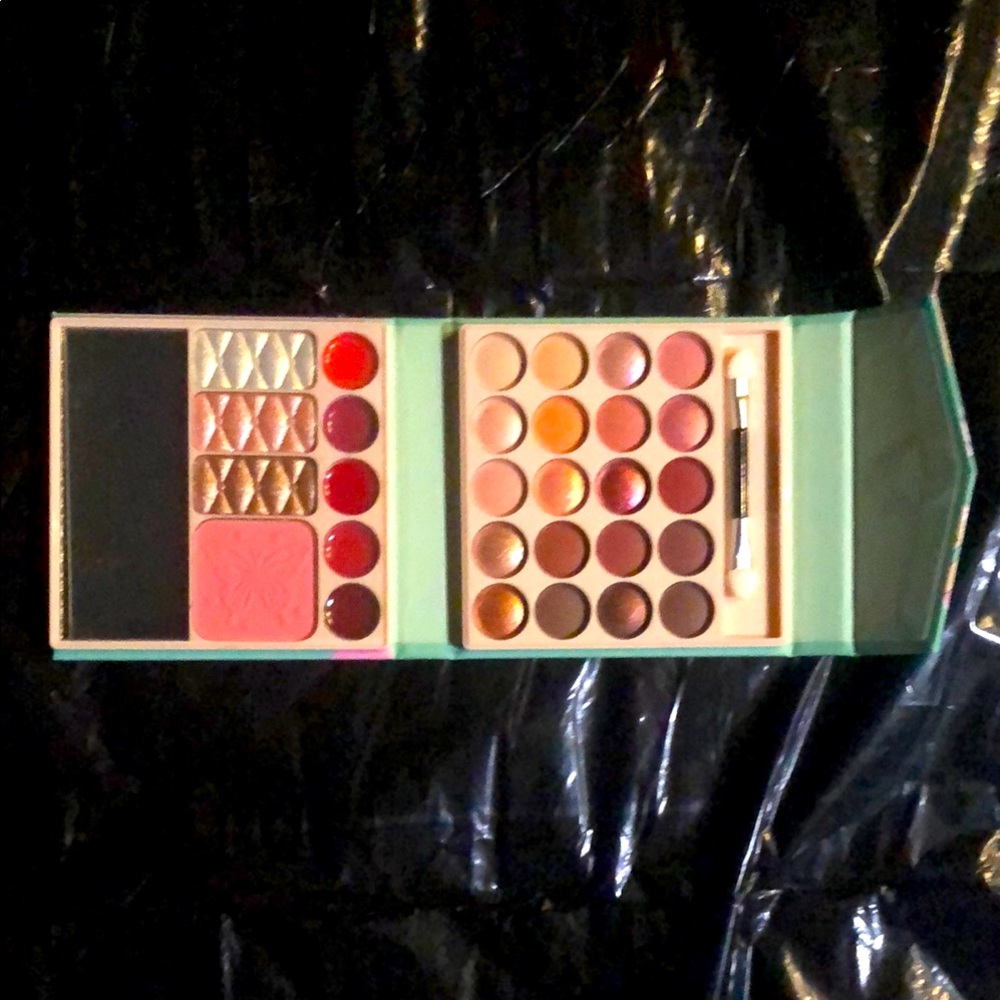 Pink and green compact makeup kit
